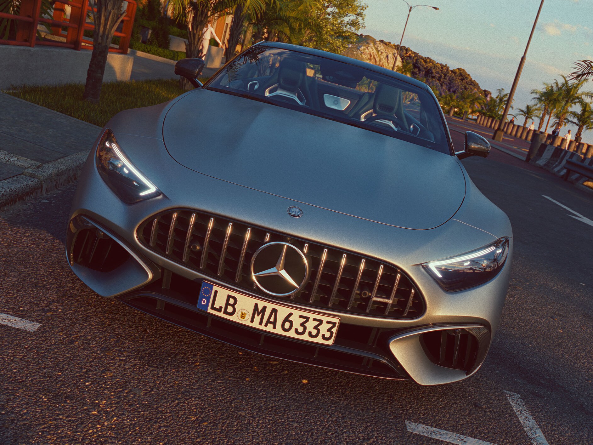 Pohled zepředu na vozidlo Mercedes-AMG SL roadster parkující na ulici.