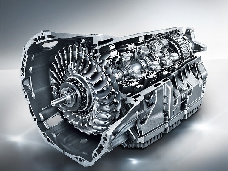 Na obrázku je automatická převodovka 9G-TRONIC vozu Mercedes-Benz Třídy E Kupé.