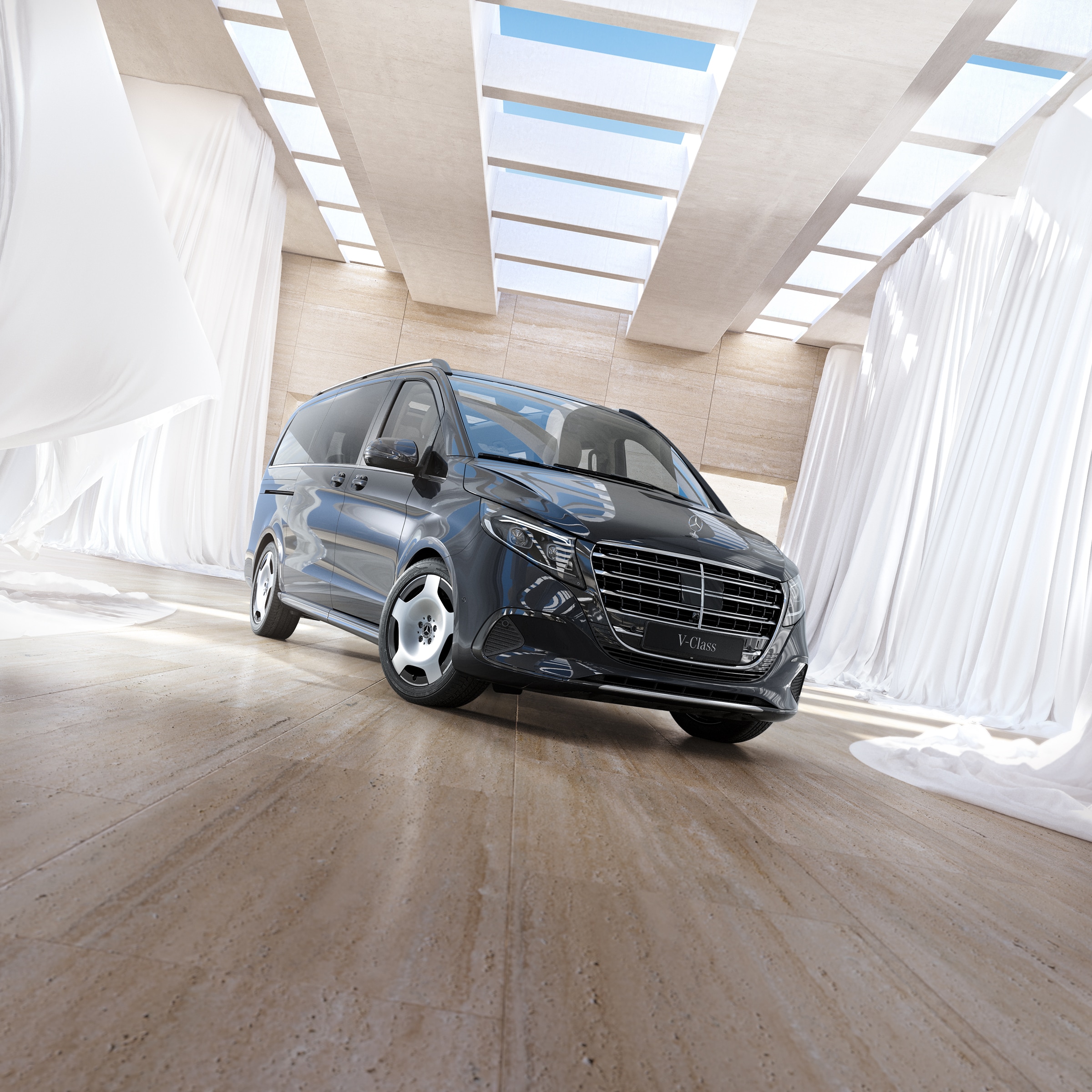Třída V | Historie užitkových vozidel | Mercedes-Benz Dodávkové vozidlo Mercedes-Benz Třídy V pro přepravu osob umístěné v moderním světlém interiéru se střešními okny