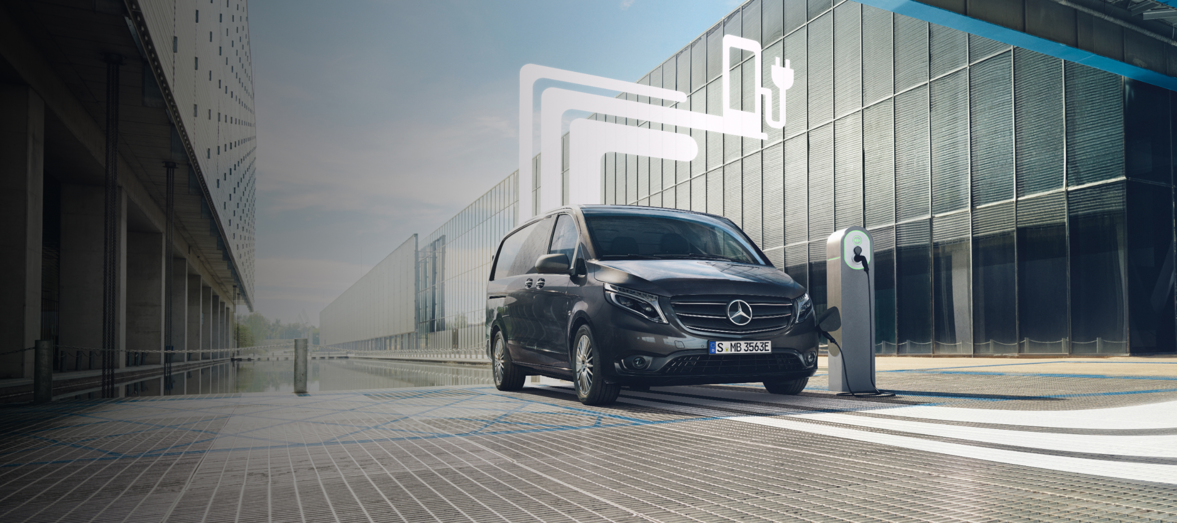 Elektromobilita | Digitální doplňky | Mercedes-Benz Dodávkové vozidlo Mercedes-Benz s grafickými prvky, které představují digitální doplňky.