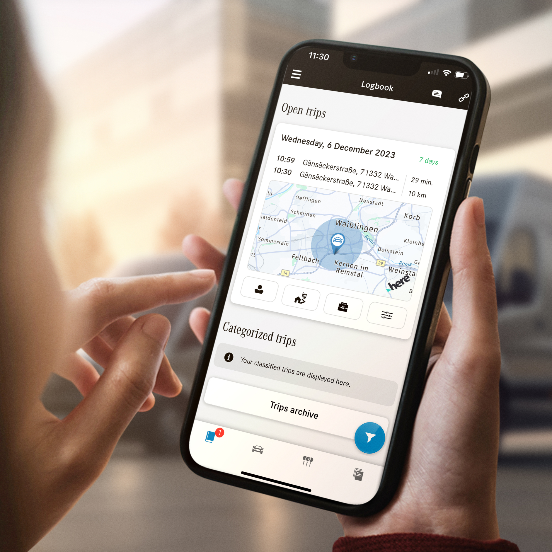 Digital Logbook | Digital Extras | Mercedes-Benz The Digital Logbook function from Mercedes-Benz on a smartphone.