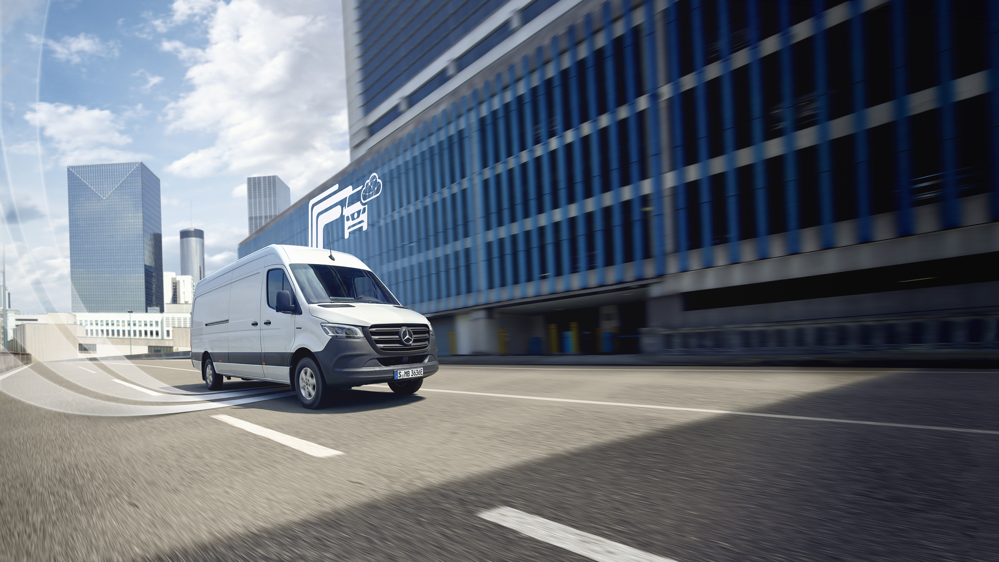 Digitální doplňky | Mercedes-Benz Dodávkové vozidlo Mercedes-Benz s grafickými prvky, které představují digitální doplňky.